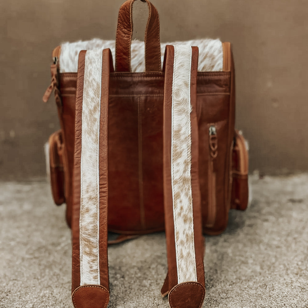 
                      
                        Howdy Cowhide Tan Backpack
                      
                    