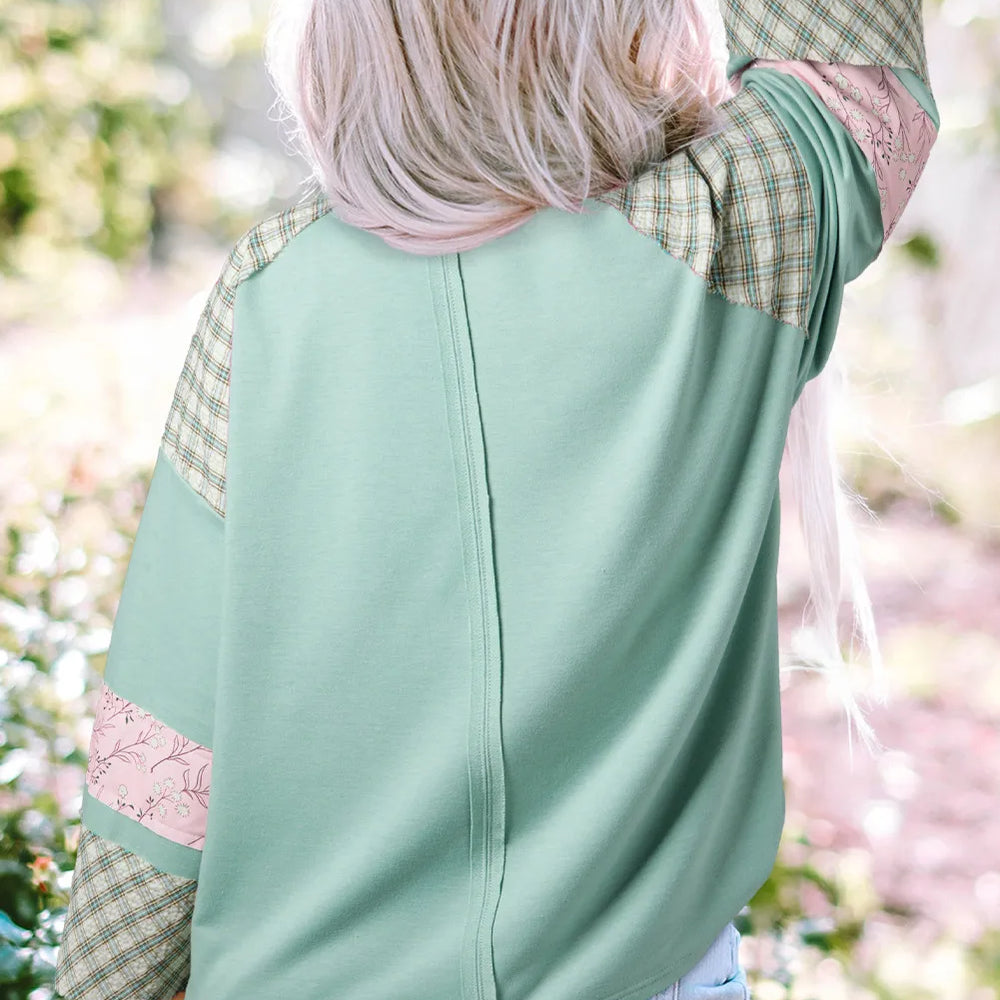 
                      
                        The Patchwork Heart Pullover
                      
                    